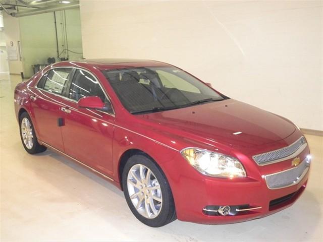 Chevrolet Malibu 2010 Kia SX Sedan