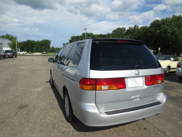 Honda Odyssey 4dr Quad Cab 160.5 DRW 4WD Laramie MiniVan