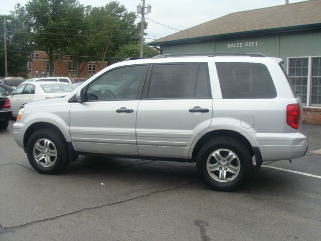 Honda Pilot 2010 Cadillac CTS SUV