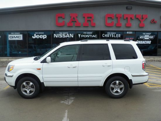 Honda Pilot 2010 Cadillac CTS SUV