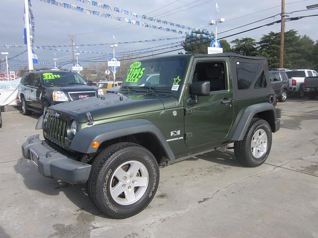 Jeep Wrangler 2WD Quad Cab SLT DRW Sport Utility