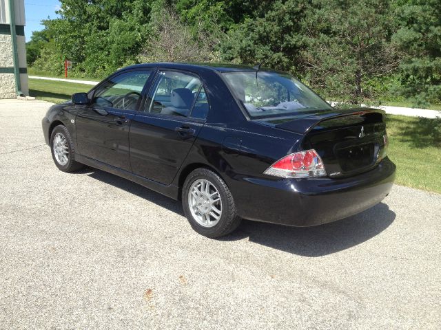 Mitsubishi Lancer LE 2WD 7-pass Sedan