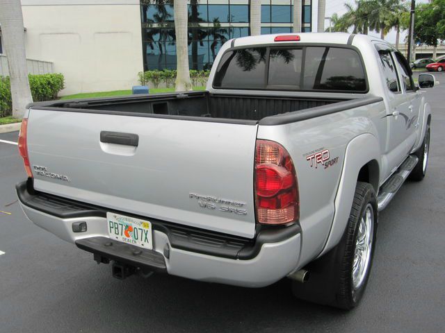 Toyota Tacoma 2011 Kia SX Pickup Truck